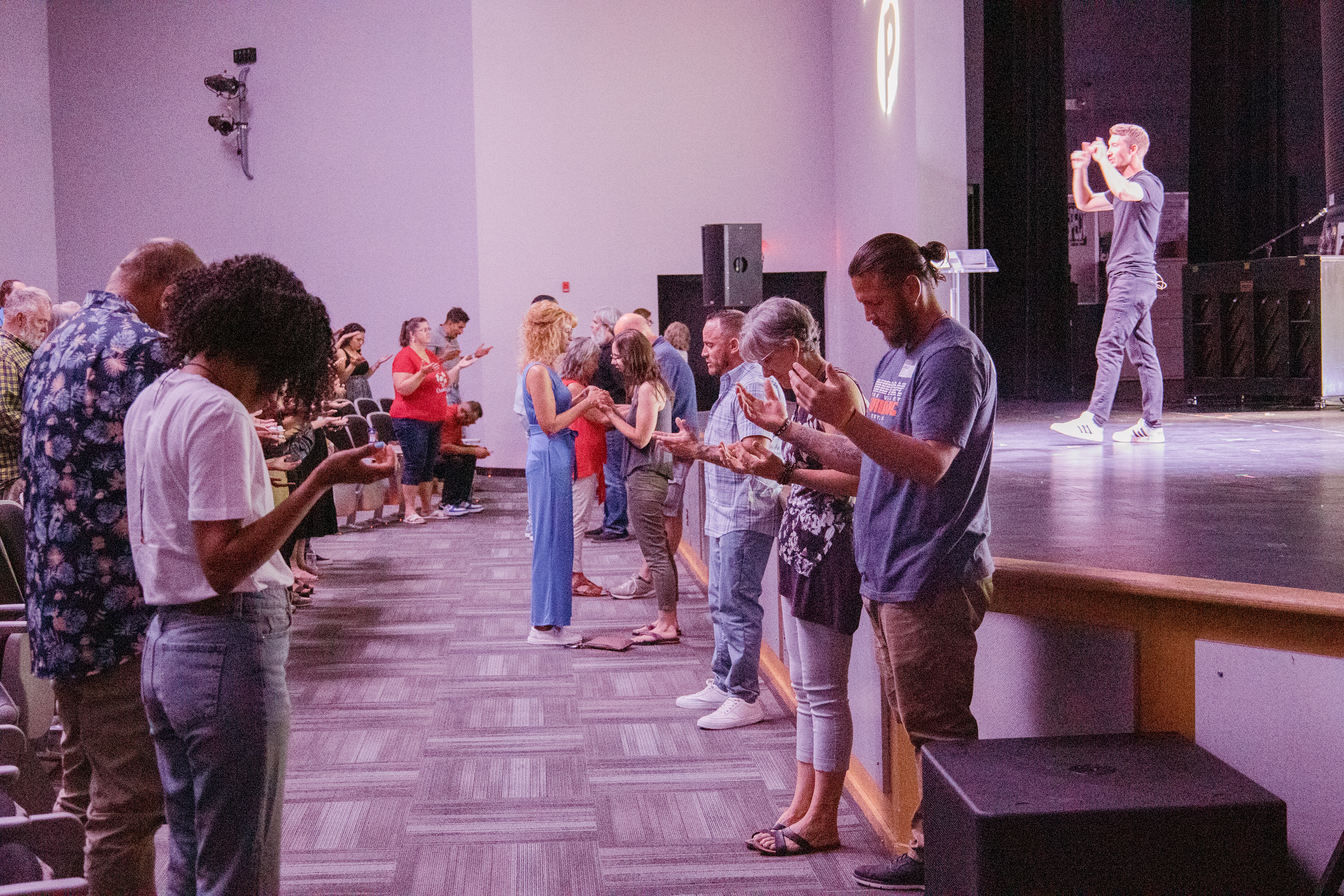 Purpose Church gathered in prayer